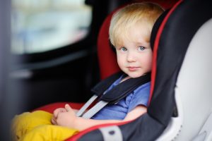 Boy in car seat