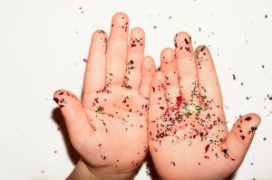 glitter on child's hands