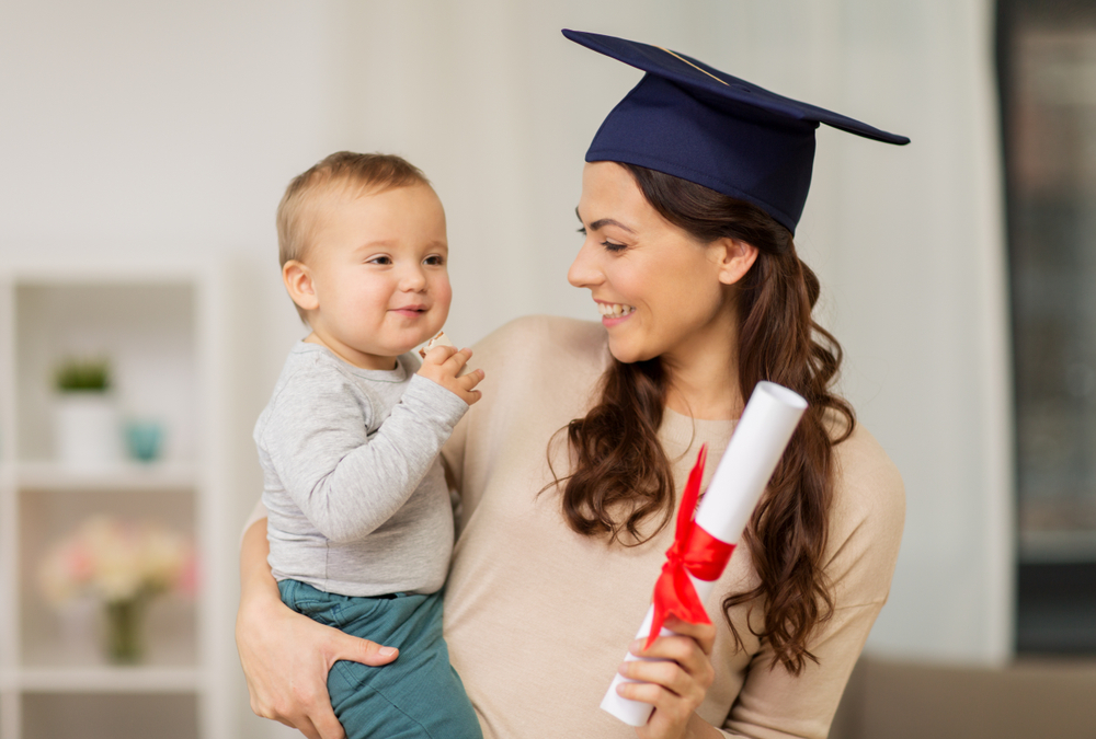 young mom graduate with baby