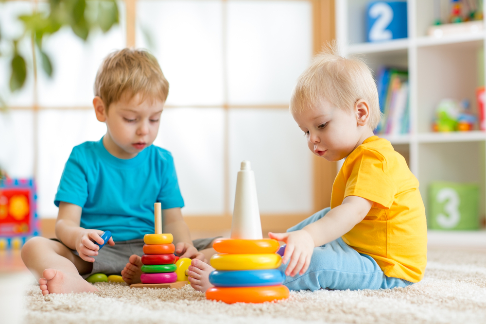 two toddlers playing