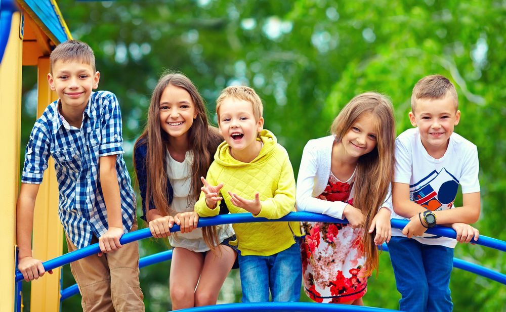 children playing outside on a playground
