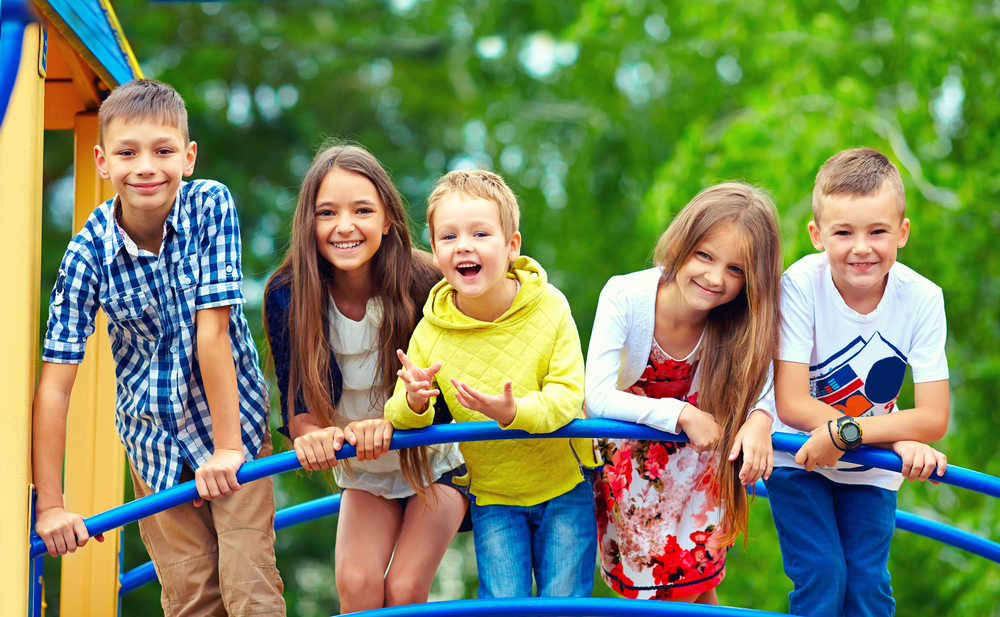 children playing outside on a playground