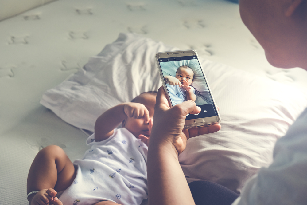 taking a picture of a baby