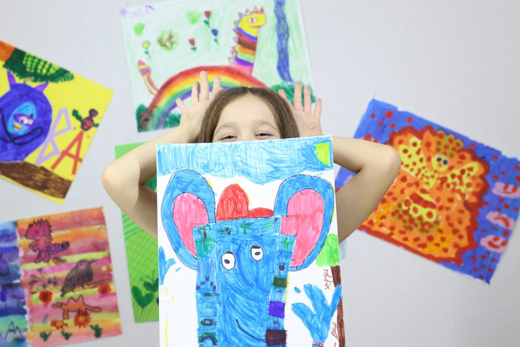 child with paintings